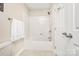Bathroom featuring a shower and bath combination, towel racks, and neutral tones, creating a functional space at 1103 Hillcrest Ridge Dr, Salisbury, NC 28146