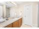 Well-lit bathroom featuring a double vanity, large mirror, and neutral color scheme for a clean and modern feel at 1103 Hillcrest Ridge Dr, Salisbury, NC 28146