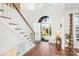Bright foyer with hardwood floors, staircase, and soaring ceilings for a grand entrance at 1103 Hillcrest Ridge Dr, Salisbury, NC 28146