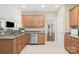 Well-lit kitchen featuring stainless steel appliances, granite countertops, and ample cabinet space at 1103 Hillcrest Ridge Dr, Salisbury, NC 28146