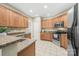 Well-appointed kitchen featuring ample cabinetry, granite countertops, and stainless steel appliances at 1103 Hillcrest Ridge Dr, Salisbury, NC 28146