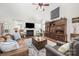 Spacious living room featuring a fireplace, large windows, and comfortable seating at 1103 Hillcrest Ridge Dr, Salisbury, NC 28146