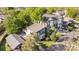 Aerial view of modern homes surrounded by green trees in an urban setting at 1121 N Alexander St, Charlotte, NC 28206