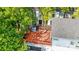 Aerial view of a wooden back deck of a modern home surrounded by mature trees at 1121 N Alexander St, Charlotte, NC 28206