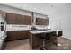 Modern kitchen with island, stainless steel appliances, and stylish backsplash at 1121 N Alexander St, Charlotte, NC 28206