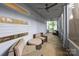 Relaxing screened-in porch with comfortable seating and a ceiling fan for outdoor enjoyment at 1121 N Alexander St, Charlotte, NC 28206