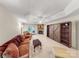 Spacious living room features a stone fireplace and barn door shelving, creating a cozy and stylish space at 115 Keswick Ln, Mooresville, NC 28117