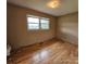 Bedroom with hardwood floors, a window, and neutral-toned walls at 1217 Stony Point Rd, Kings Mountain, NC 28086