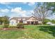 Beautiful clubhouse with manicured lawn, and signage visible, offering park, tennis, and fitness facilities at 12357 Copper Mountain Blvd, Charlotte, NC 28277