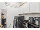 Well-organized laundry room featuring a washer and dryer plus counter space for small appliances at 12357 Copper Mountain Blvd, Charlotte, NC 28277