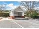 Community mailboxes with covered parking spots on a sunny day at 12357 Copper Mountain Blvd, Charlotte, NC 28277