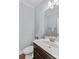 Well-lit bathroom with a clean, modern sink, vanity, and mirror at 12746 Bravington Rd, Huntersville, NC 28078