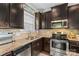 Well-appointed kitchen with stainless steel appliances and granite countertops at 12746 Bravington Rd, Huntersville, NC 28078