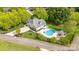 Beautiful home with in-ground pool, patio, and lush landscaping at 130 Hopedale Ct, Mooresville, NC 28117