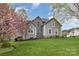 Charming home with a stone accent and lush green lawn, perfect for outdoor enjoyment at 130 Hopedale Ct, Mooresville, NC 28117