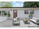 Comfortable back porch with modern furniture, perfect for relaxing and enjoying the outdoors at 1341 Hopewell Rd, Rock Hill, SC 29730