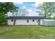 Home exterior highlighting the backyard with lush grass and shed at 1341 Hopewell Rd, Rock Hill, SC 29730