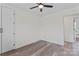 Empty bedroom with ceiling fan, window, door, and closet at 1341 Hopewell Rd, Rock Hill, SC 29730