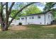 Well-maintained home showcasing a manicured lawn, and white exterior at 1341 Hopewell Rd, Rock Hill, SC 29730