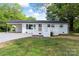 Charming, freshly painted single-story home with a covered carport and welcoming front porch at 1341 Hopewell Rd, Rock Hill, SC 29730