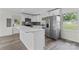 Bright kitchen featuring white cabinets, stainless steel appliances, and a center island with quartz countertop at 1341 Hopewell Rd, Rock Hill, SC 29730