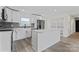 Modern kitchen featuring white cabinets, stainless steel appliances, and a large center island at 1341 Hopewell Rd, Rock Hill, SC 29730
