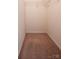Walk-in closet with neutral carpet and wire shelving at 1430 Eastway Dr, Dallas, NC 28034