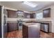 Modern kitchen with stainless steel appliances and central island for food preparation at 1430 Eastway Dr, Dallas, NC 28034