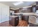 Modern kitchen with stainless steel appliances and central island for food preparation at 1430 Eastway Dr, Dallas, NC 28034