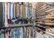 Spacious walk-in closet with built-in shelving and plenty of storage space at 14869 Santa Lucia Dr, Charlotte, NC 28277