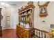 Classic dining area featuring wooden bench and display cabinet and traditional accents at 14869 Santa Lucia Dr, Charlotte, NC 28277