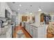 Spacious kitchen with granite counters, stainless appliances, and large center island at 14869 Santa Lucia Dr, Charlotte, NC 28277