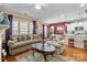 Open living space featuring a formal dining room, a modern kitchen, and a cozy living room at 14869 Santa Lucia Dr, Charlotte, NC 28277