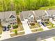 Aerial shot of homes showcasing manicured lawns, driveways, and landscaping at 1588 Trentwood Dr, Fort Mill, SC 29715
