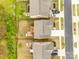 Aerial view of the backyard with a deck and a patio, surrounded by well-manicured lawns at 1588 Trentwood Dr, Fort Mill, SC 29715