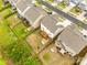 Aerial view of the backyard with a deck, patio, and fenced yard at 1588 Trentwood Dr, Fort Mill, SC 29715
