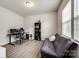 Comfortable bedroom with a futon, desk, and ample natural light from a large window at 1588 Trentwood Dr, Fort Mill, SC 29715