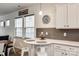Cozy breakfast nook adjacent to kitchen with quartz countertop and stylish decor at 1588 Trentwood Dr, Fort Mill, SC 29715
