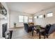 Cozy living room with a fireplace, plenty of natural light, and modern furnishings at 1588 Trentwood Dr, Fort Mill, SC 29715