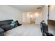 Upstairs loft space with comfortable seating, a large window, and plush carpet at 1588 Trentwood Dr, Fort Mill, SC 29715