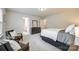 Spacious main bedroom with access to the ensuite and carpeted floor at 1588 Trentwood Dr, Fort Mill, SC 29715