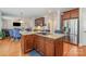 Kitchen with granite countertops, stainless steel appliances and breakfast nook at 16636 Flintrock Falls Ln, Charlotte, NC 28278