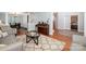 Cozy living room showcasing hardwood floors, stylish furniture, and an open layout with seamless flow at 16636 Flintrock Falls Ln, Charlotte, NC 28278