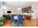 Cozy living space with hardwood floors and built in shelving at 16636 Flintrock Falls Ln, Charlotte, NC 28278