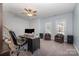 Bright home office with neutral walls and carpet at 16636 Flintrock Falls Ln, Charlotte, NC 28278