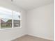 Bright bedroom with large window and modern flooring, offering a serene and inviting space at 1706 30Th Avenue Ne Ct, Hickory, NC 28601