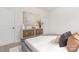 Cozy bedroom featuring soft lighting, stylish dresser, and neutral color palette at 1706 30Th Avenue Ne Ct, Hickory, NC 28601