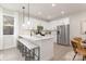 Bright kitchen with white cabinetry, stainless steel appliances, a large island, and ample counter space at 1706 30Th Avenue Ne Ct, Hickory, NC 28601