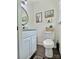 Bathroom featuring a toilet, vanity with a granite countertop, and stylish decor at 171 Westmoreland Rd, Mooresville, NC 28115
