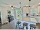 Charming kitchen with granite island and counters, stainless appliances, and backyard views at 171 Westmoreland Rd, Mooresville, NC 28115